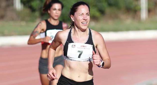 Libertas athlete Mona Lisa Camilleri racing on the track